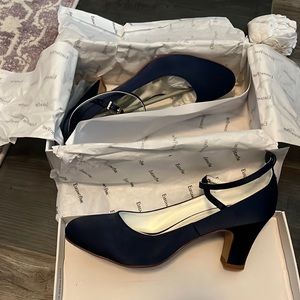 Never worn navy heels, size 8